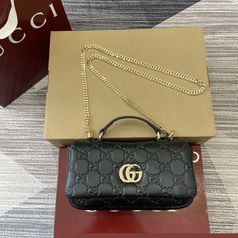 G*u*i top handle bags